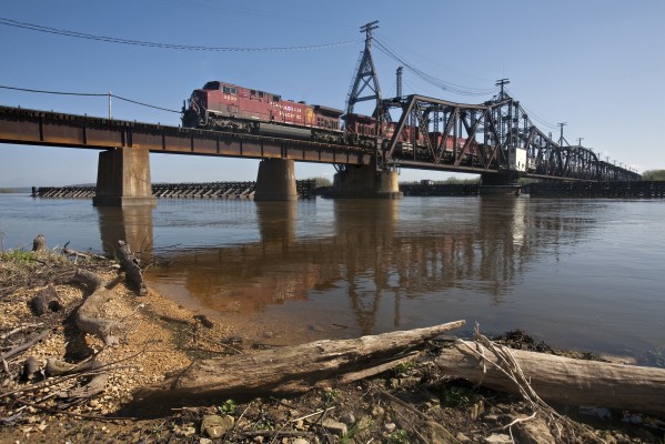 Canadian Pacific northbound empty ethonal train 641 crossing the Mississippi River at Subula, Iowa, on March 25, 2012. CP 8636 and two mates lead two ider cars and 157 empty tankcars back to the ethonal plants on Iowa's "Corn Line."