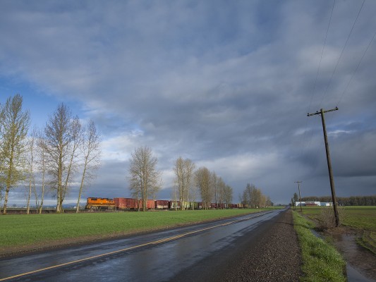 Portland and Western's American Turn freight train rolls up the Willamette Valley following a rain shower on the morning of February 25, 2010.