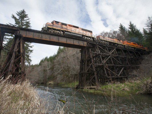 Portland and Western's Toledo Hauler crosses the Marys River on a timber and steel trestle on March 7, 2010.