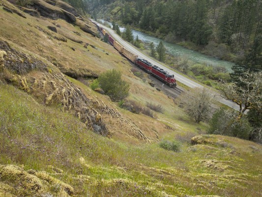 Don't let the hayseed name fool you: Cow Creek Canyon in southwestern Oregon is a stunning place. It provided a route for the first railroad linking Oregon and California in the 1880s, and today it still sees a few trains a week of the Central Oregon and Pacific.