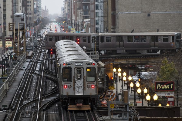 Two Chicago L trains meeting at Tower 12 in the southeast corner of the Loop.