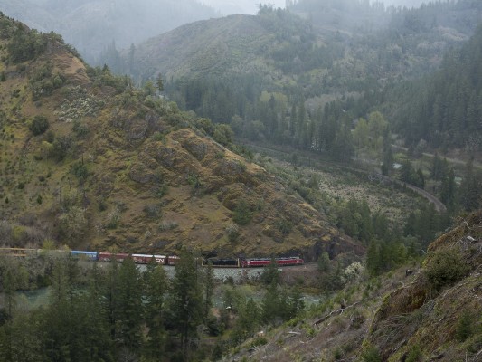 Central Oregon and Pacific Railroad freight train negotiating a horseshoe curve in Cow Creek Canyon near Peck, Oregon, on April 8, 2010.