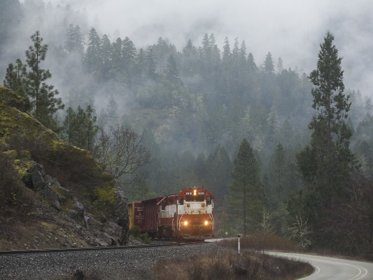 Central Oregon and Pacific Railroad freight train entering Cow Creek Canyon on the foggy morning of February 1, 2010.