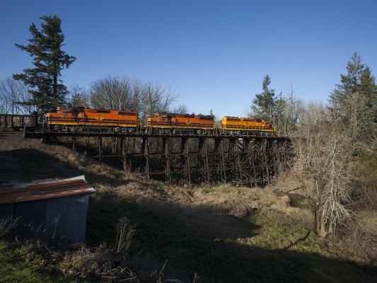 Portland and Western's Westsider freight train rolls north over a timber trestle in Amity, Oregon, on December 2, 2009.
