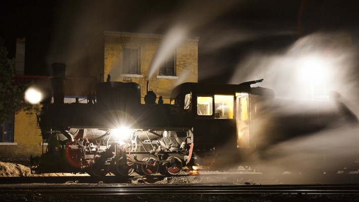 Narrow-Gauge 0-8-0 C2 steam locomotive 044 waits in the small yard at Lixin on the evening of September 28, 2005.