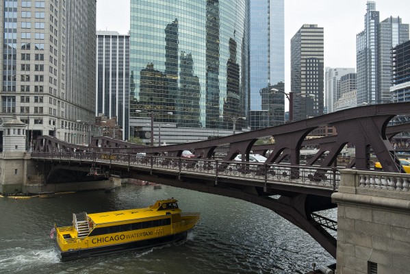 Chicago Water Taxi passing under the Franklin Street Bridge on the Chicago River.