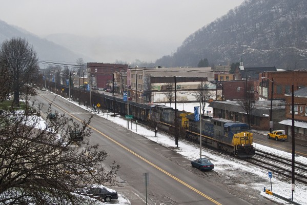 On a gray winter day in 2005, an eastbound CSX coal train threads the college town of Montgomery, West Virginia.