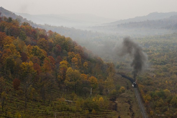 The weather was dull but the trees were colorful in the hills east of Lixin on September 29, 2005, where a loaded coal train is returning from the Hongguang mines.