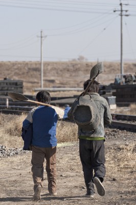 Two young railway workers at the Jitong yard in Daban, Inner Mongolia, China, in fall 2005.