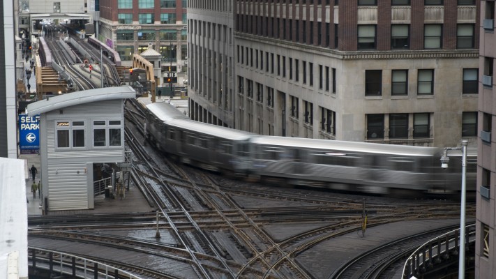 Outbound Brown Line train turning north at Tower 18 in Chicago's Loop.