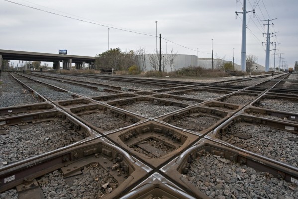 Ash Street crossing in Chicago, Illinois, on November 6, 2011. The views are down the Canadian National (ex-IC) to the right and down Norfolk Southern (ex-CJ) and CSX (ex-B&OCT) to the left.