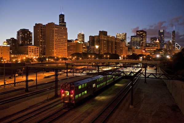 Inbound Metra Electric commuter train stopping at University Park in Chicago at dusk on September 14, 2011.
