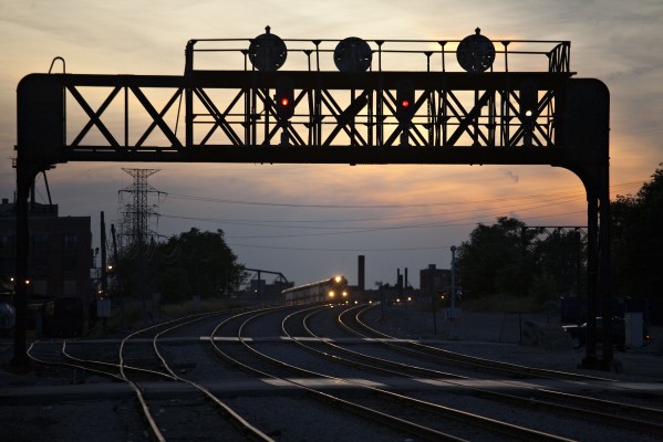 Inbound Metra commuter train approaching Chicago Union Station at Racine Avenue just after sunset on September 15, 2011.