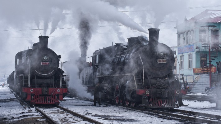 SY-class 2-8-2 steam locomotives at the Chengzihe Dongchang rail yard on the Jixi Coal Railway.