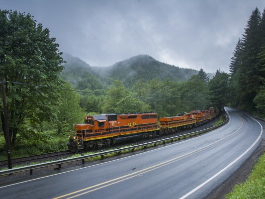 Portland and Western's Toledo Hauler rolls east through the Coast Range mountains along U.S. highway 20 on June 10, 2010.