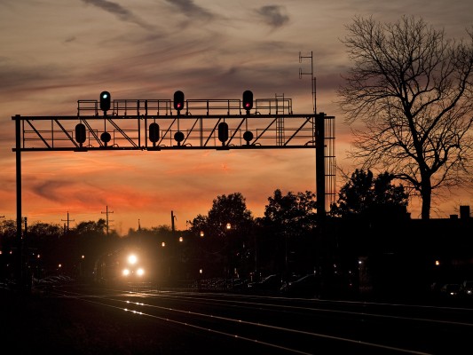 Eastbound Union Pacific grain train approaching Glen Ellyn, Illinois, at twilight on November 5, 2011.