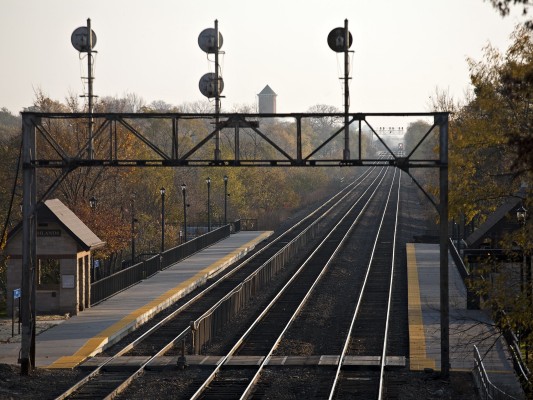 BNSF westbound empty coal train approaching the Highlands Station in Hinsdale, Illinois, on November 6, 2011.
