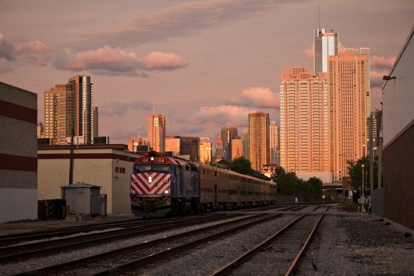 Outbound Metra commuter train departing Chicago at Racine Avenue at dusk on September 14, 2011.