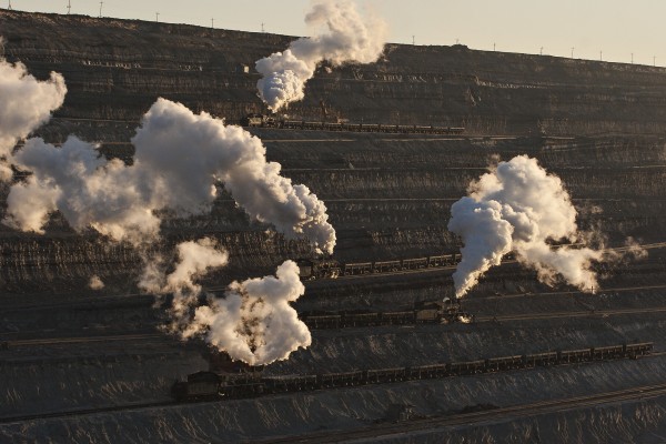 Steam trains on many levels of track inside the massive Zhalainuoer coal mine in Inner Mongolia near the Russian border.