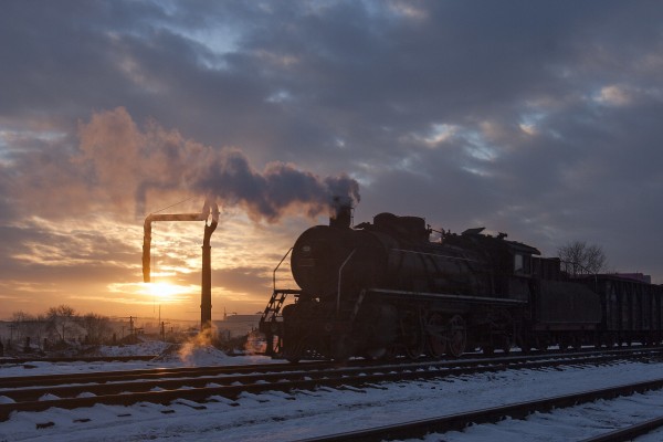 SY locomotive at sunset on the Jixi Coal Railway.