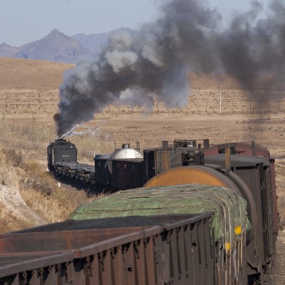 An eastbound Jitong Railway freight train departs Daban, Inner Mongolia, China, behind a single QJ steam locomotive in October 2005.