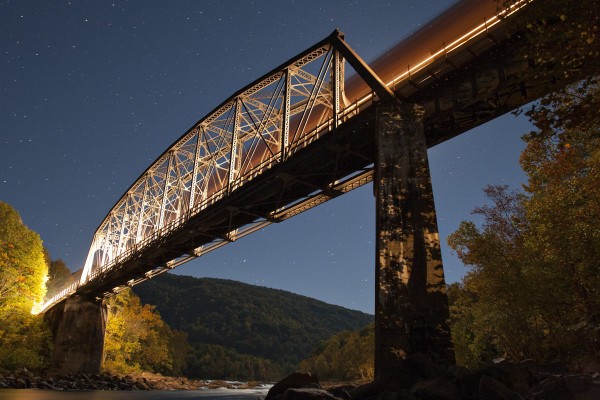 CSX eastbound coal train crossing the New River at remote Sewell, West Virginia, on a moonlit autumn night in 2007.