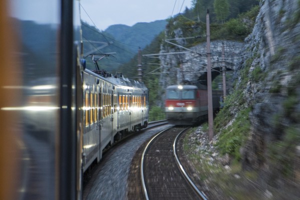 Northbound freight train meeting a southbound local passenger train at twilight just outside of the 46-foot-long Krauselklause Tunnel at Breitenstein.