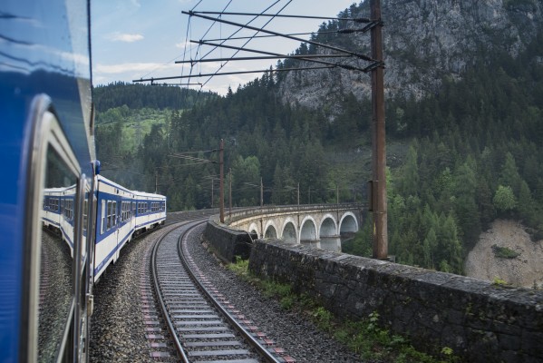 Looking out the window of an early-morning local train crossing Kalte Rinne Viaduct before sunrise.