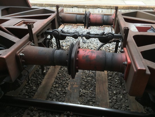 European standard couplers use hooks, turnbuckles, and buffers.