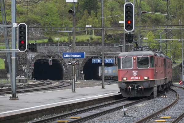 A container train north exits the Gotthard Tunnel at Goeschenen. This is likely the last freight train I will ever see on this spectacular mountain railway. A few minutes later, I made the biggest mistake of my life as a railroad photographer. I left.