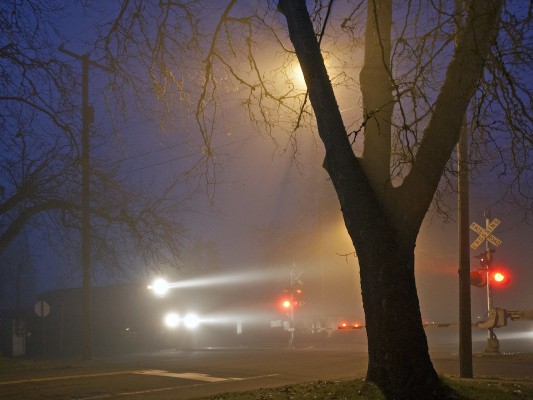 Portland and Western's Toledo Hauler cuts through thick fog in Corvallis, Oregon, on the evening of February 4, 2009.