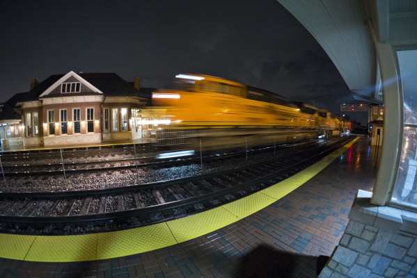 Eastbound BNSF Railway unit crude oil train passing the depot in Western Springs, Illinois.