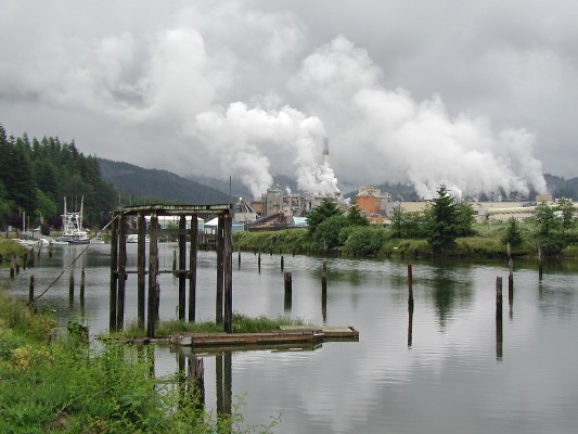 Georgia-Pacific's sprawling kraft paper mill sends steam into the low clouds hanging above Toledo, Oregon, and the Yaquina River on June 27, 2002, during my first visit to the Beaver State.