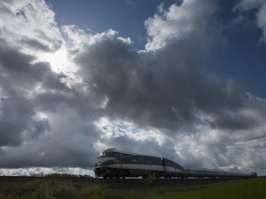 Amtrak <i>Cascades</i> passenger train no. 504 rolls down the Willamette Valley under a dramatic spring sky above western Oregon on May 11, 2009.