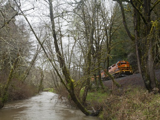 The Yaquina River is much smaller stream away from the tidal influence of the coast as Portland and Western's Toledo Hauler heads east on March 31, 2011.