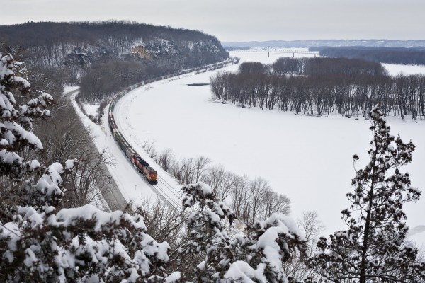 BNSF westbound grain train passing the Mississippi Palisades near Savanna, Illinois, on January 21, 2012.