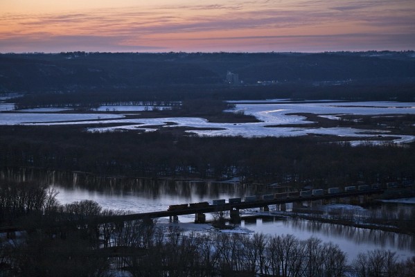 BNSF eastbound stack train crossing the Wisconsin River at Prairie du Chien, Wisconsin, just after sunset on February 18, 2012.