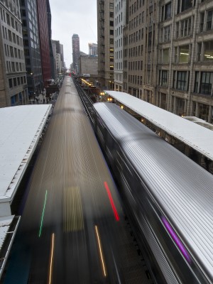 Two Chicago L trains passing at Adams station in the Loop.