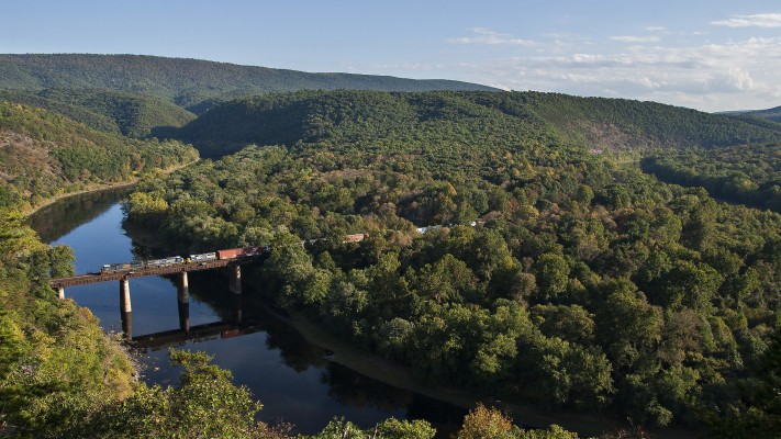 CSX eastbound mixed freight train crossing the Potomac River between Maryland and West Virginia on the Magnolia Cutoff.