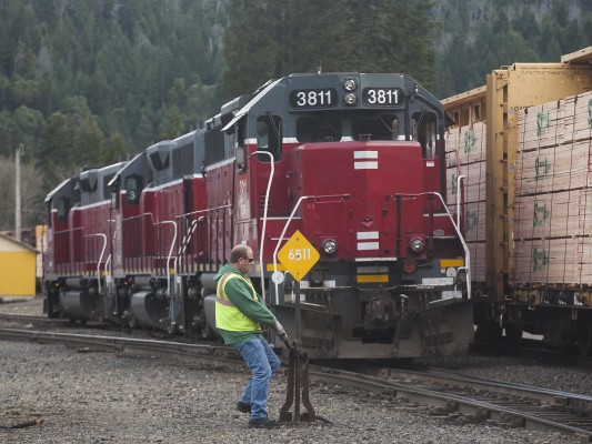 Central Oregon and Pacific Railroad conductor throwing a switch in the small yard in Glendale, Oregon, on February 8, 2010.