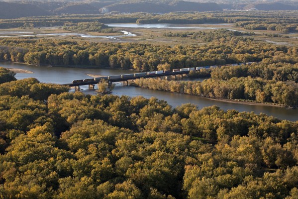 BNSF eastbound intermodal train (likely the ZSEACHC or ZPTLCHC) crossing the Wisconsin River just south of Prairie du Chien, Wisconsin, just before sunset on October 7, 2012.